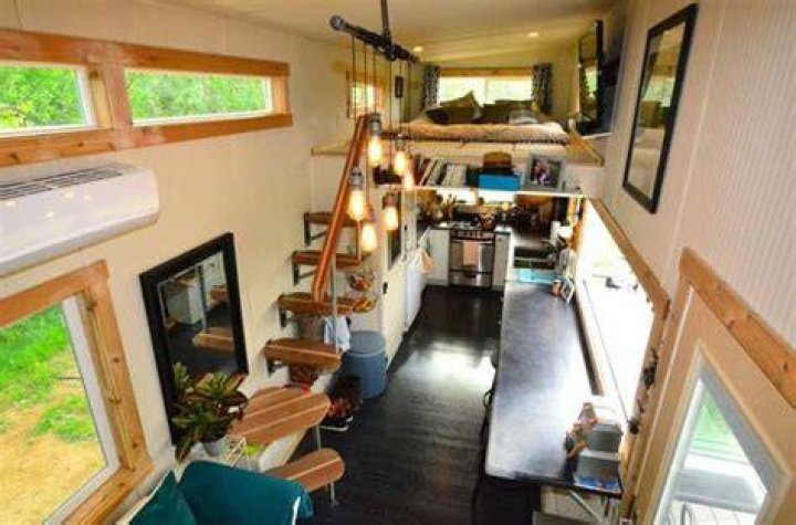 Do the tiny house nation hosts live in tiny houses?
