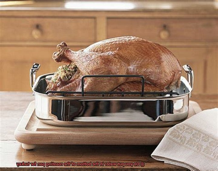 Do you put water in the bottom of the roasting pan for Turkey?