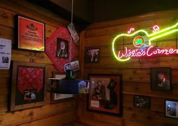 Does Willie Nelson own Texas Roadhouse?