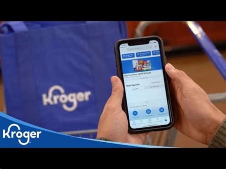 How do I load paper coupons on my Kroger card?