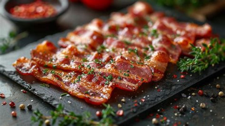 How do I make precooked bacon crispy?