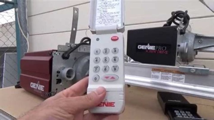 How do I reprogram my garage door opener remote?
