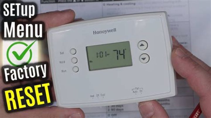 How do I reset my digital thermometer?