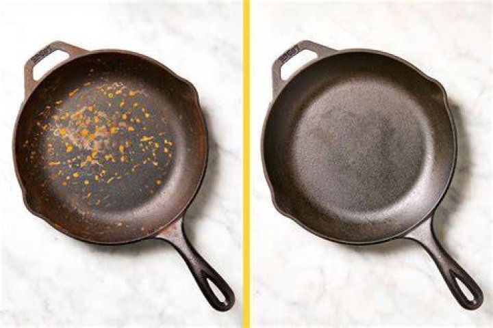 How do I stop my cast iron skillet from smoking?