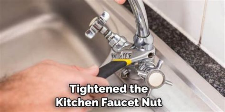 How do I tighten the nut under the kitchen sink faucet?