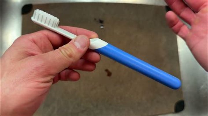 How do you clean a quip toothbrush?