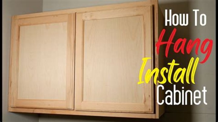 How do you hang a heavy cabinet on the wall?