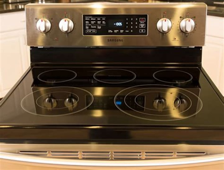 How do you lift a stove top?