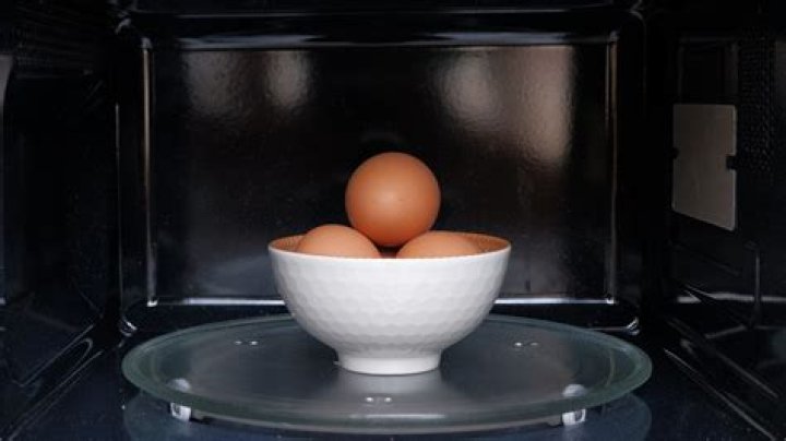 How do you microwave an egg without it exploding?