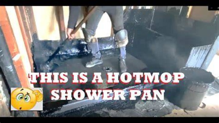 How do you prepare a hot mop shower pan?