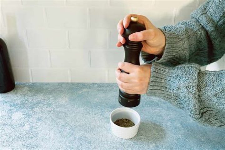 How do you refill a Peugeot pepper mill?