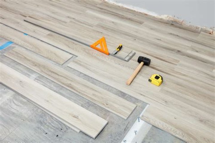 How do you repair a hole in a vinyl floor?
