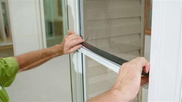 How do you replace the screen on a Pella storm door?