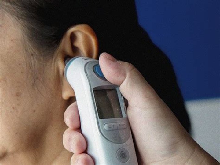 How do you reset an ear thermometer?
