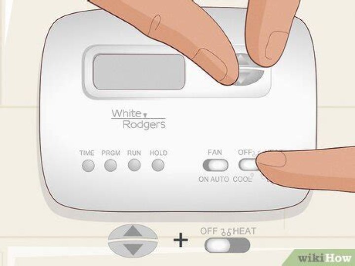 How do you reset the filter on a White Rodgers thermostat?