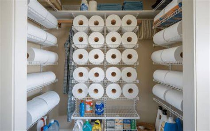 How do you store extra paper towel rolls?
