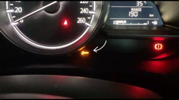 How do you turn off the wrench light on a Mazda 3?