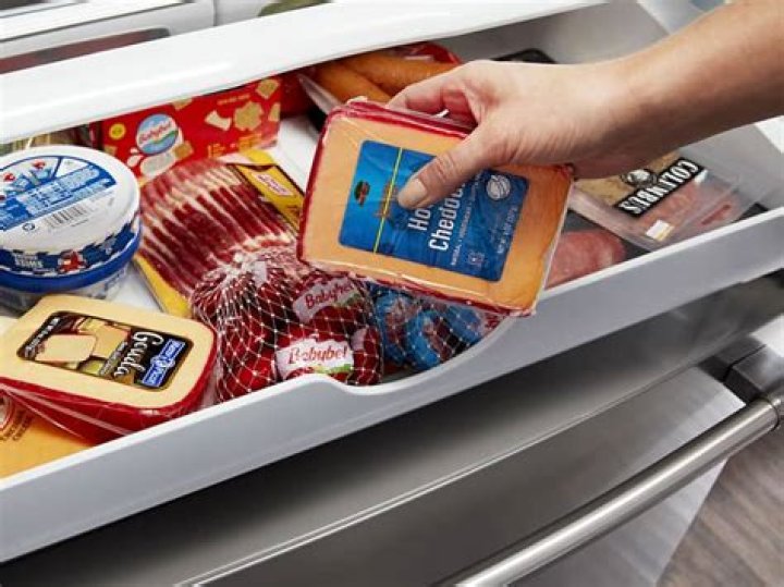 How long does sliced American cheese last in the refrigerator?
