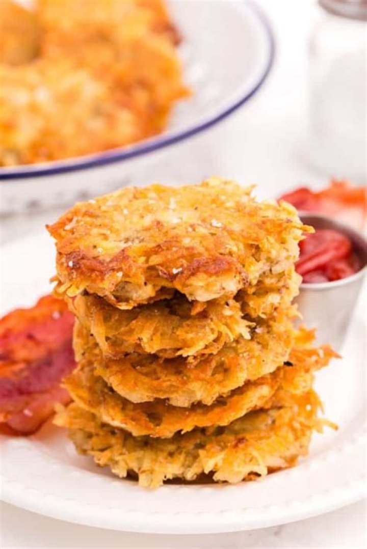 How many calories are in a cup of shredded hash browns?