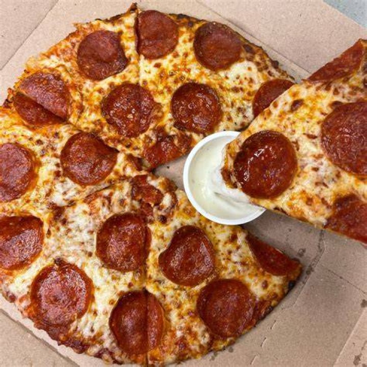 How many slices are in a medium Godfather’s Pizza?