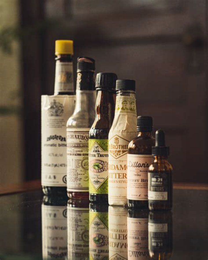 How much is a dash of bitters in Oz?