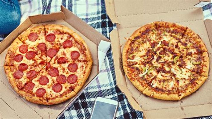 How much is two medium pizzas at Dominos?