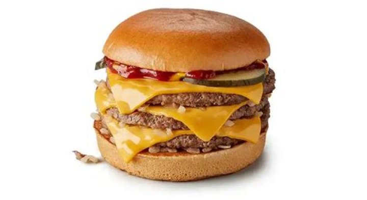 How much meat is in a triple cheeseburger?