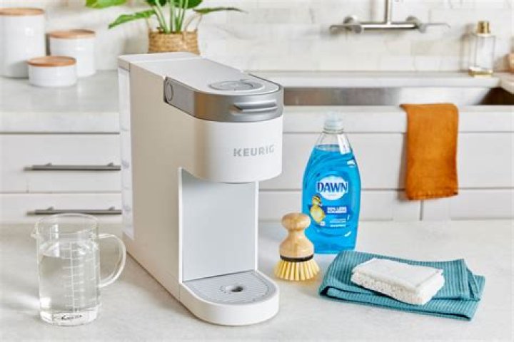 How much vinegar do you put in a 12 cup coffee maker to clean it?