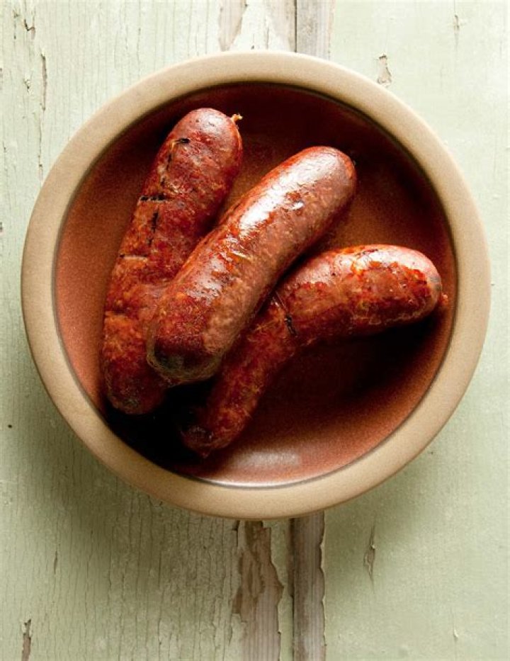 Is andouille sausage pink when cooked?