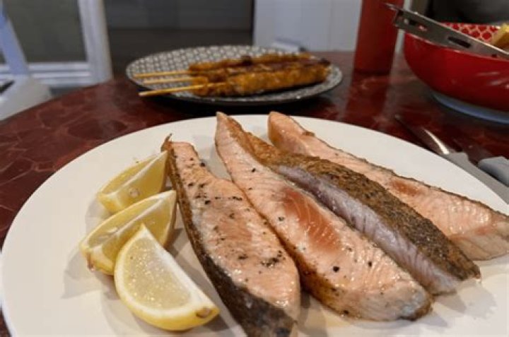 Is it OK to eat undercooked salmon?