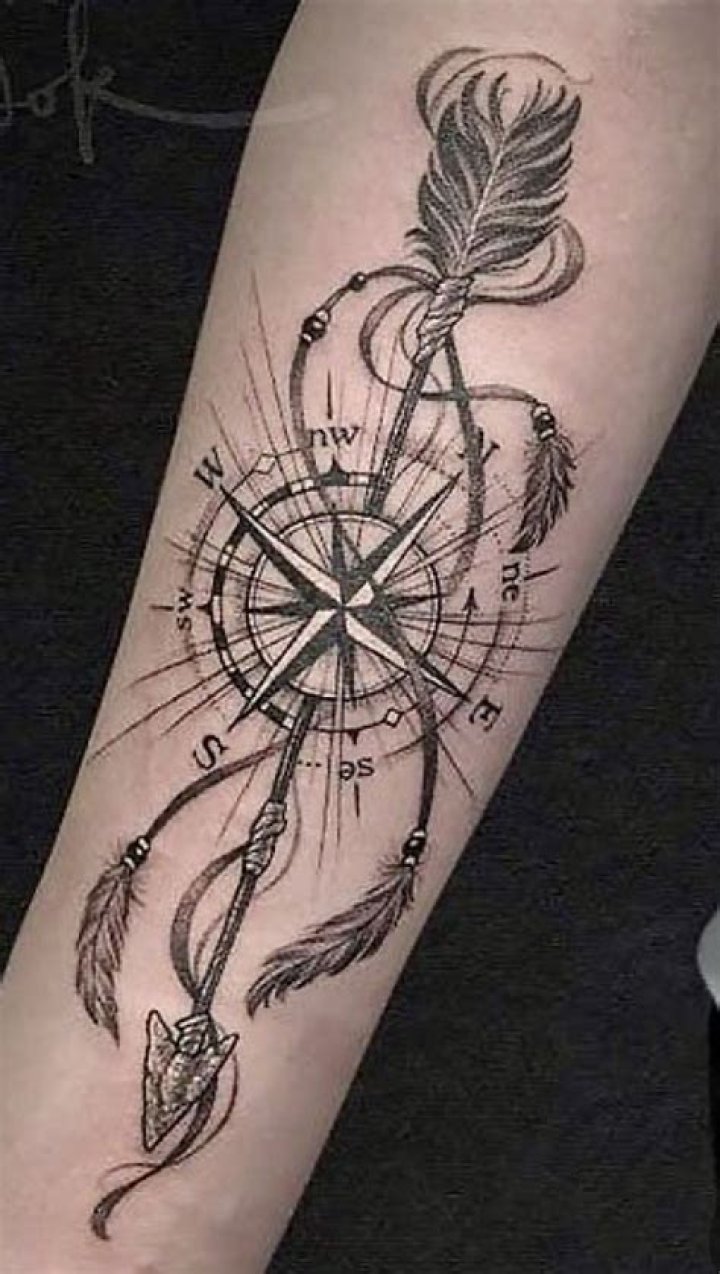 Should an arrow tattoo point up or down?