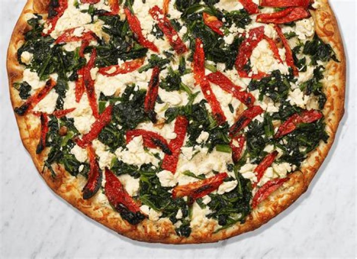 What are Donatos signature pizzas?