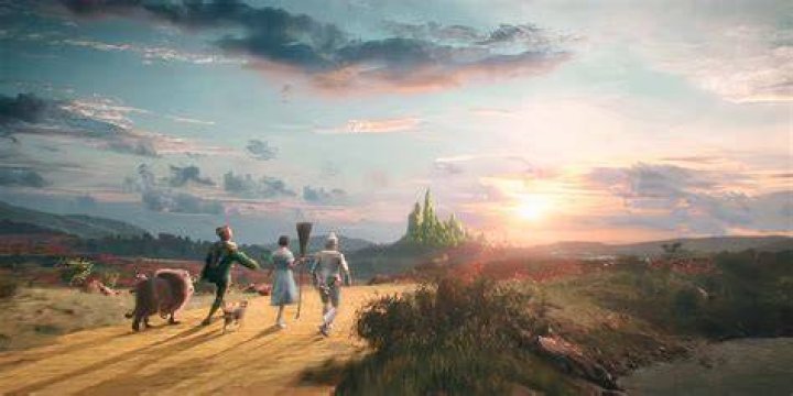 What causes Dorothy to wake up from the poisonous poppy field?