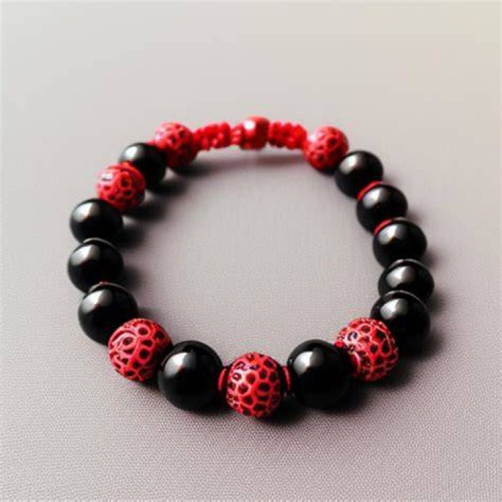 What do red beads symbolize?