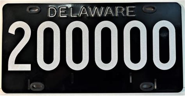 What does a black license plate mean in Delaware?