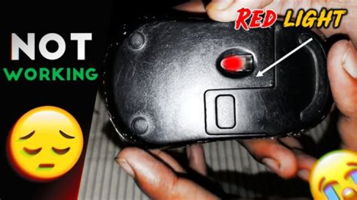 What does flashing red light on Microsoft mouse mean?