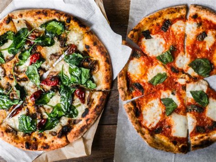 What goes on a Neapolitan pizza?