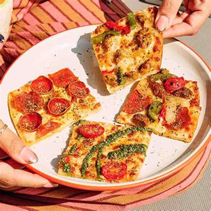 What is a tavern style pizza?