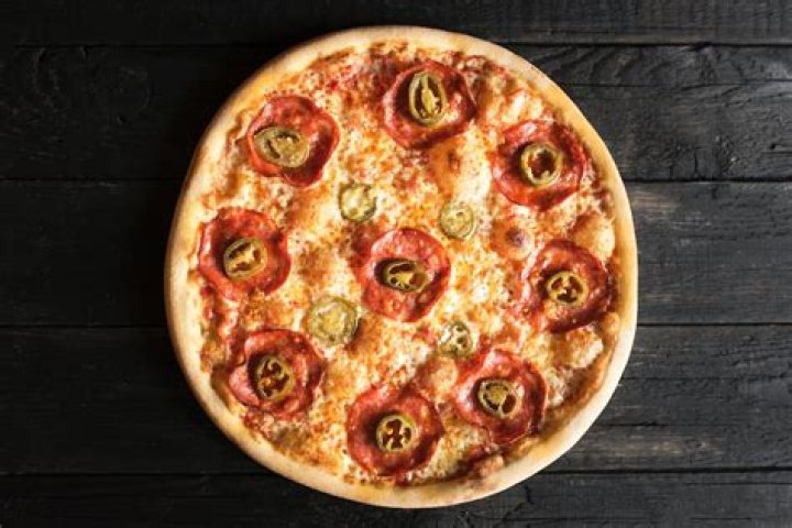 What is a Toppers Tall Boy pizza?