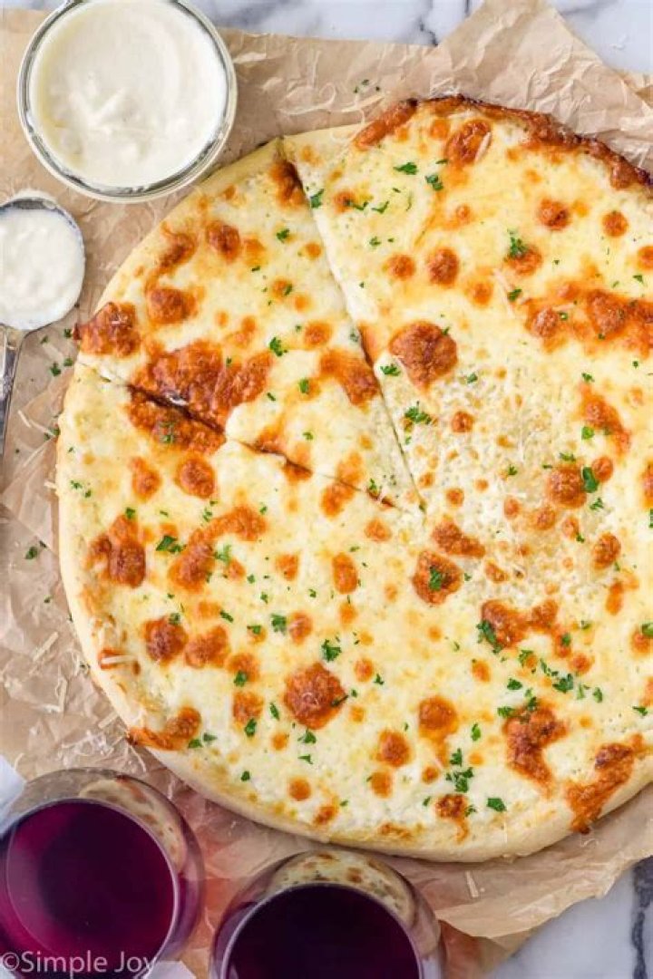 What is white sauce on Domino’s pizza?