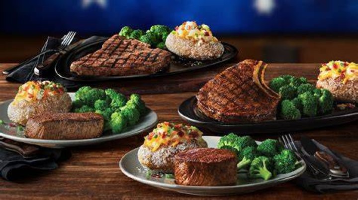 What sides come with steak at Outback?