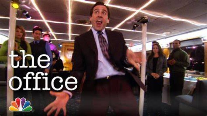 What song does Michael Scott dance to on the booze cruise?