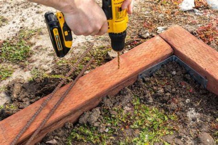 What to use to hold down landscape timbers?