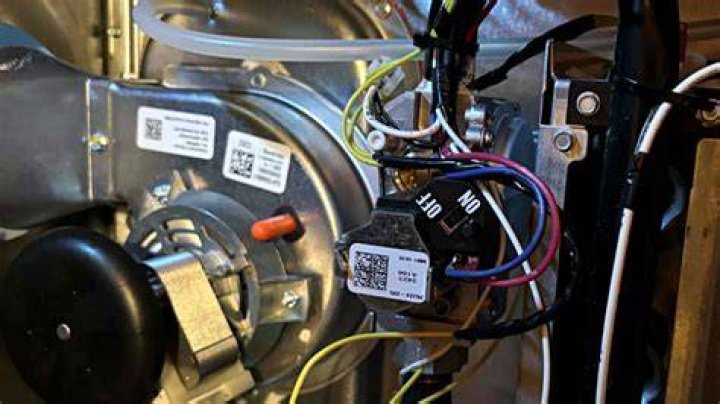 Where is the reset button on AC compressor?