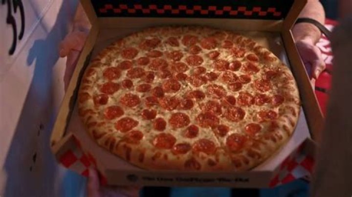 Which pizza brand does Craig Robinson spokesperson represent?