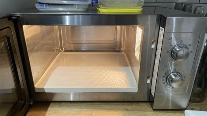 Why do drawer microwaves have no turntables?