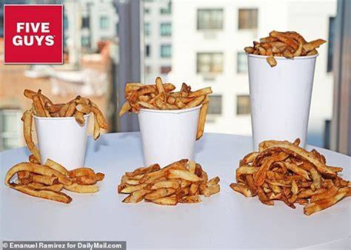 Why does Five Guys give extra fries?
