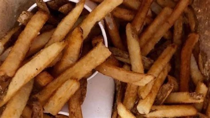 Why does Five Guys have extra fries?